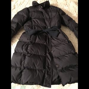 Navy blue J Crew women’s long puffy jacket.
